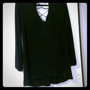 long blouse or it can be worn as a dress